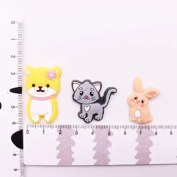 33 sortes 1 pièces animaux chien lapin chat girafe PVC chaussures de jardin breloques chaussures déc