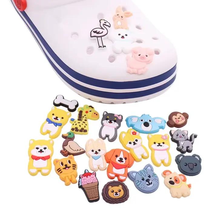 33 sortes 1 pièces animaux chien lapin chat girafe PVC chaussures de jardin breloques chaussures déc