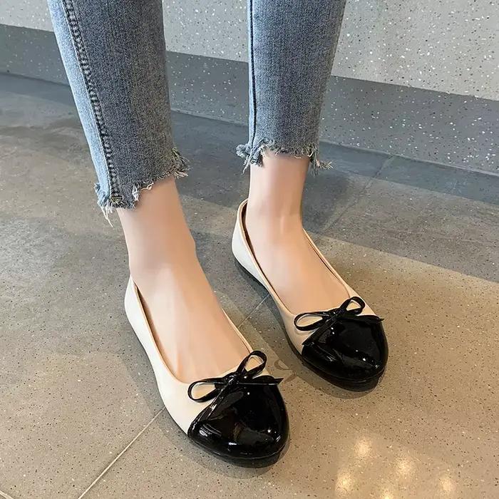 Ballerines à nœud bicolores noir et beige