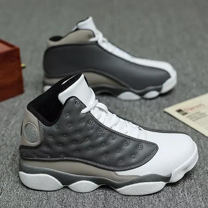 Chaussures de basketball d'extérieur antidérapantes à semelle en caoutchouc résistantes à l'usure, design montant, respirantes et confortables pour l'entraînement quotidien et l'athlétisme