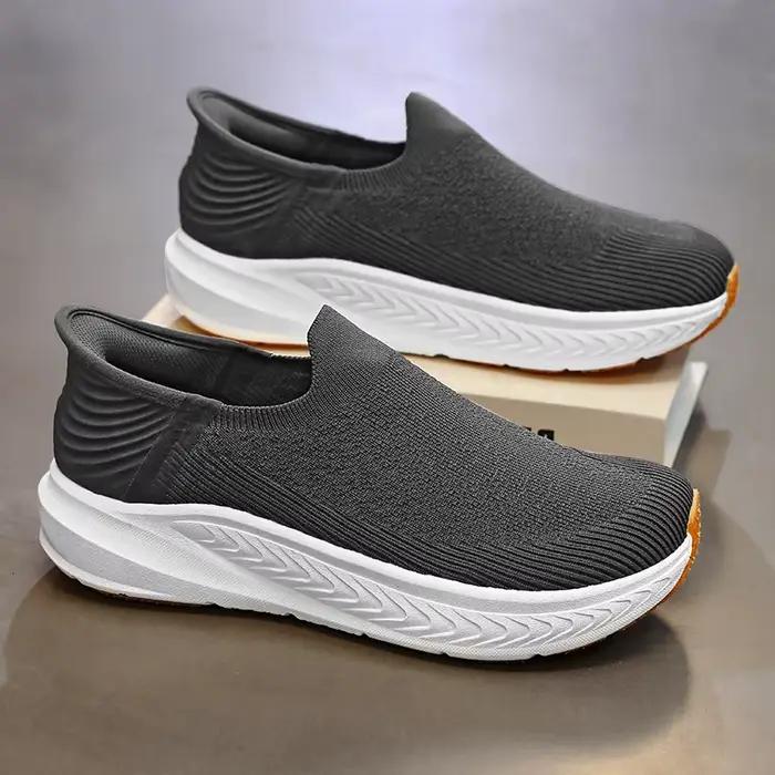 Chaussures de course noires en tricot pour hommes
