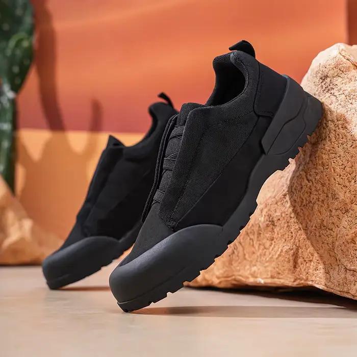 A pair of versatile all-season outdoor casual shoes for men; lightweight athletic running shoes and