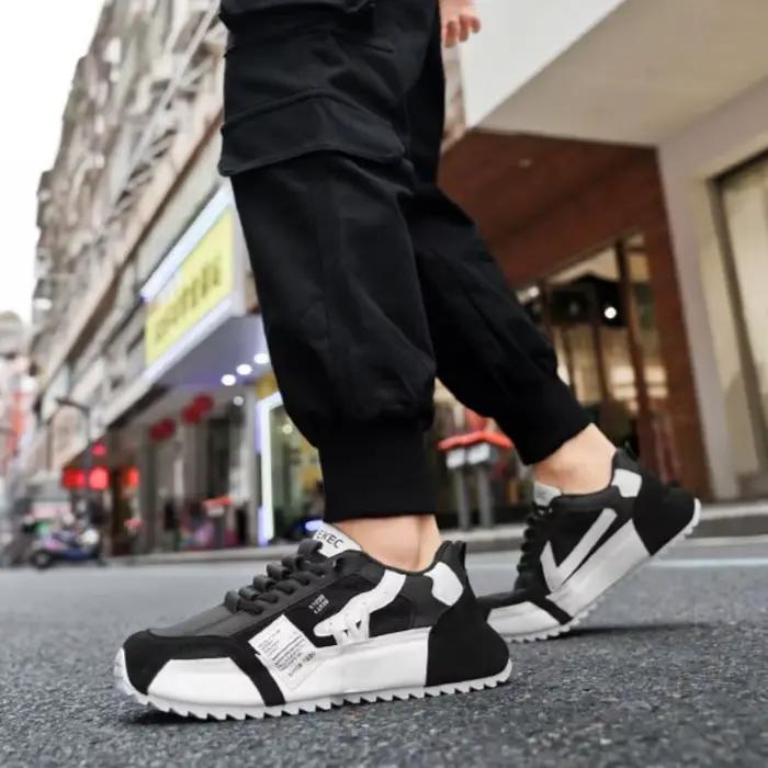 Baskets pour hommes chaussures d'entraînement de tennis de luxe 2025New chaussures décontractées Sport chaussures de course pour homme printemps automne matériaux respirants et légers